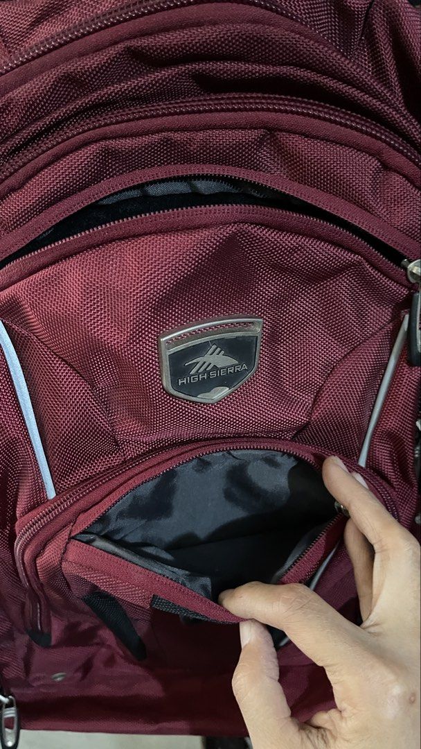 High Sierra Backpack (Category: Backpacks) located in Manila. Submitted by akismurabels (Listing ID 1433992471, Image 3). Description: - High Sierra backpack in maroon - Multiple compartments and pockets for storage - Padded back panel for comfort - Adjustable shoulder straps - Top handle and side pockets - Features High Sierra logo LARGE CAPACITY DURABLE THICK MATERIAL PERFECT FOR TRAVEL OR WVERYDAY USE WITH LAPTOP COMPARTMENT PM IF INTERESTED.