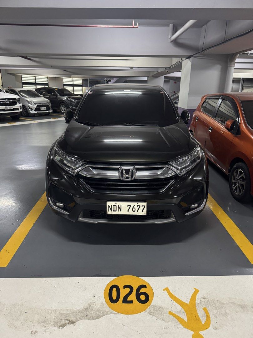 Honda CR-V 2.0 i-VTEC (A) (Category: Used Cars) located in Muntinlupa City. Submitted by minimonmoni (Listing ID 1433985308, Image 3). Description: 🚗 2018 Honda CR-V 2.0 Gas AT – Dark Olive Green 💰 780k PHP 📅 Sept 2019 | 1st owner (Honda Makati) 📊 ~61k km | Clean title | Plate 7 (Thu coding) 🔧 CASA maintained (records) | Recent PMS last Jun 2026| Smooth drive | Cold AC | Clean in/out ✨ Leather seats | Infotainment | Reverse cam | Cruise cont