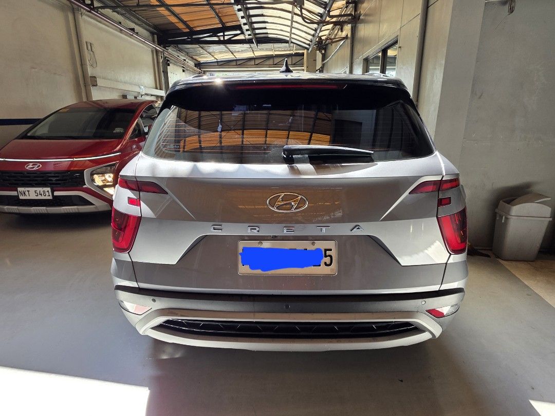 Hyundai Creta GLS IVT Auto (Category: Used Cars) located in Pasig City. Submitted by reyandrew (Listing ID 1434003794, Image 3). Description: 2024 HYUNDAI CRETA 1.5 GLS A/T Automatic Transmission Silver First Owner Fully Paid No Issues end plate: 5 (wednesday coding) odometer: 7,000 KM good as new asking price: 900,000 php.