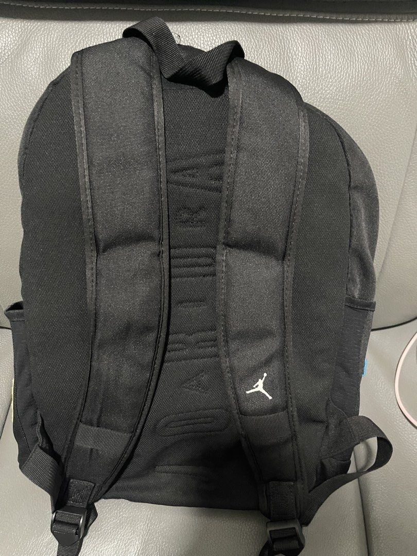 Jordan patch backpack (Category: Backpacks) located in Singapore. Submitted by milkycarou456 (Listing ID 1434122402, Image 2). Description: - Multiple compartments for organization - Includes main compartment and smaller pockets - Features Jordan branding and patches - Perfect for school or everyday use -height- 47cm -width- 40cm.