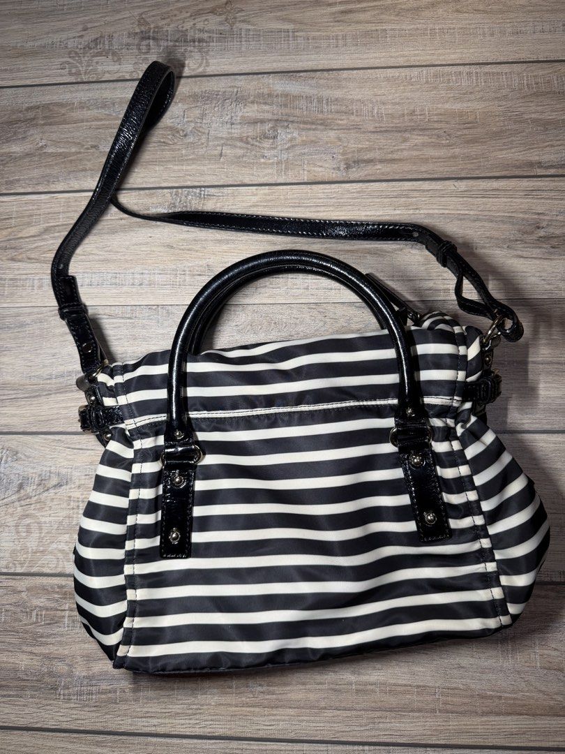 Kate Spade New York Striped Handbag (Category: Luxury Bags & Wallets) located in Imus. Submitted by badtzma (Listing ID 1434160367, Image 2). Description: Selling Kate Spade Nylon stripe leslie black/cream original bought in japan last year 2199 php slightly negotiable Slightly used No issues RFS - unloading di na nagagamit sa dami bag ni wife/ dispose na daw para magamit pa ng iba Loc: Imus/Indang MOP: Gcash/Cash/Bank Transfer MOD: Meetup/Lalamo