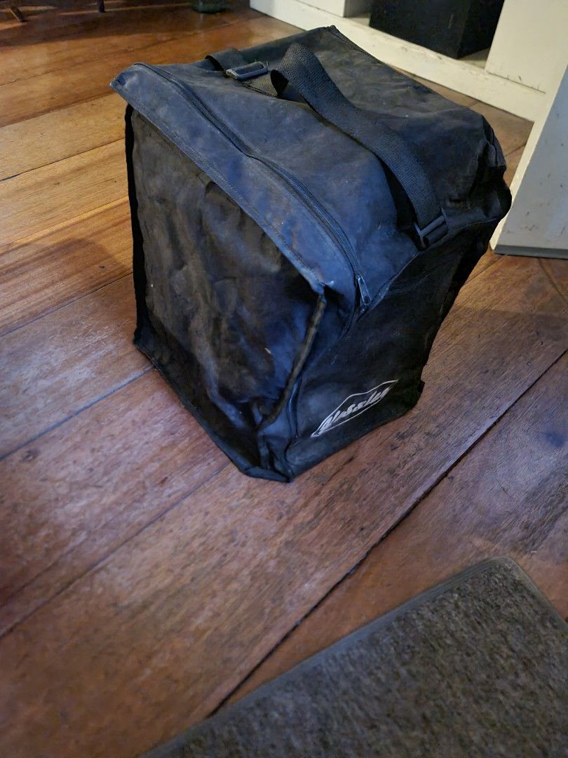 Kessler Cajon (Category: Musical Instruments) located in Mandaluyong City. Submitted by jldo28 (Listing ID 1434170160, Image 3). Description: - Kessler cajon with a unique dark, swirling design. - Light-colored front panel with Kessler logo. - Includes a black carrying bag. - Well-maintained and ready for use..