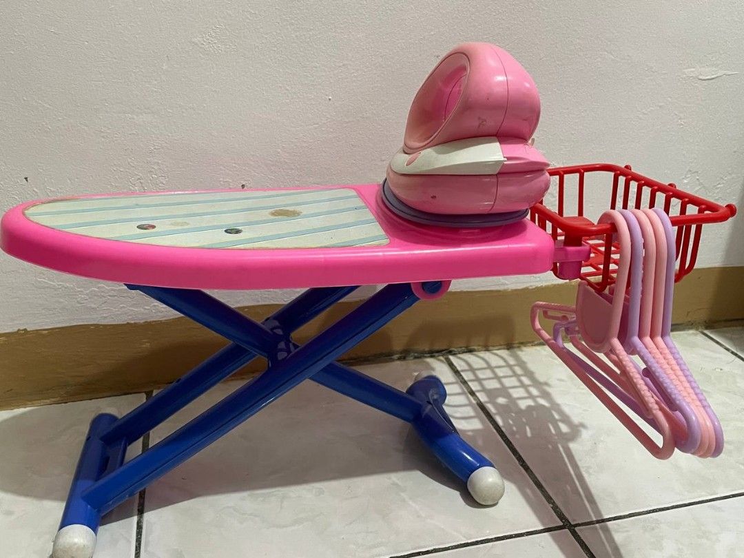 Kids' Toy Ironing Board Set (Category: Kids Toys) located in Manila. Submitted by lucky.panda.online.s_hawk (Listing ID 1434107628, Image 2). Description: 🧺 DELUXE TOY IRONING SET (Pink & Blue) The ultimate Ironing set for your mini-helper, complete with all the accessories! ✨ Features: ✔️ Includes a toy iron, red side basket, and hangers ✔️ Decorative ironing surface pattern and side-mount basket ✔️ Blue legs for steady playtime 🎁 Perfect for 