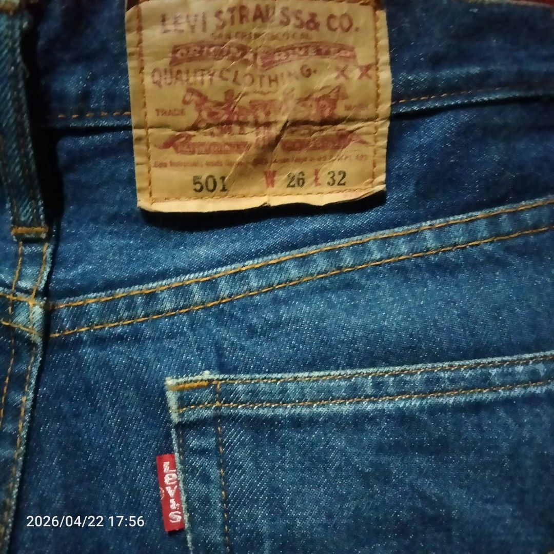 Levi's 501 Jeans - Size 26x32 (Category: Jeans) located in Manila. Submitted by mk_ukay (Listing ID 1434064722, Image 3). Description: - Levi's 501 jeans - Dark wash - Size: 26x32 - Features the iconic red Levi's tag - Button fly - Classic five-pocket design - Levi Strauss & Co. label visible - A classic piece.