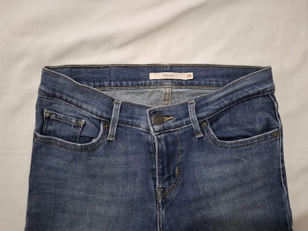 Levi's 512 Slim Fit Jeans - Size 25 (Category: Jeans) located in Pilar. Submitted by missteapot (Listing ID 1434048976, Image 2). Description: - Authentic Levi's 512 slim fit jeans - Size: 25 - Classic blue wash - Features Levi's red tab and stitching - Button closure and five-pocket design - Made with durable denim - Includes Levi's brand label.
