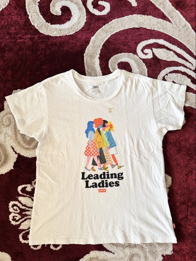 Levi's Leading Ladies Graphic Tee (Category: Shirts) located in Davao. Submitted by engrd. (Listing ID 1434071282, Image 1). Description: 19 width x 24 length may konting himulmol no major flaws.