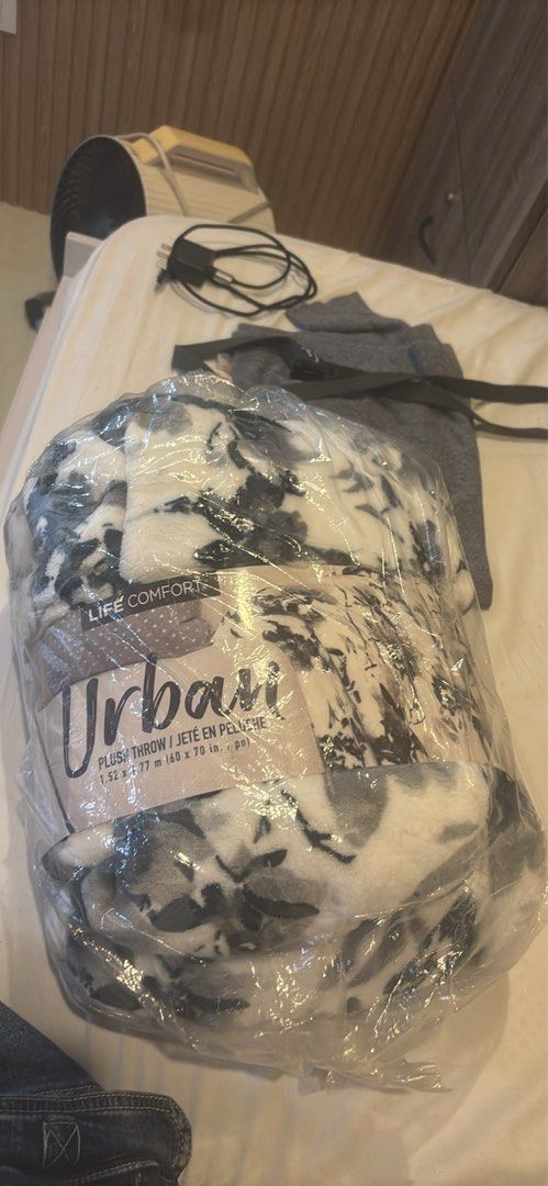 Life Comfort Urban Plush Throw Blanket (Category: Bedding & Towels) located in Las Pinas. Submitted by declutterdownsize (Listing ID 1433992447, Image 1). Description: - Life Comfort Urban plush throw blanket - Brand new, still in original packaging - Features a stylish black and white marble design - Generous size: 1.52 x 1.77 m (60 x 70 in.) - Super soft and comfortable - Perfect for adding warmth and style to your home.