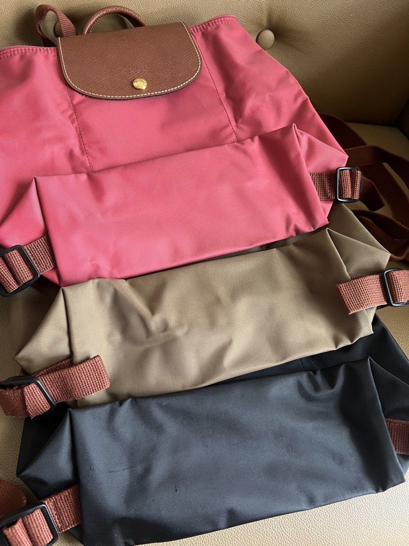 Longchamp Le Pliage backpack (Category: Luxury Bags & Wallets) located in Quezon City. Submitted by felizdoss (Listing ID 1434013720, Image 2). Description: No flaws. Used once on a trip. No flaws. RFS: decluttering Colors: black, red, green.