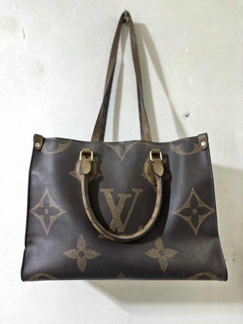 Louis Vuitton OnTheGo GM Tote Bag (Category: Luxury Bags & Wallets) located in Manila. Submitted by aezamirae (Listing ID 1434019874, Image 1). Description: - Louis Vuitton OnTheGo GM tote bag - Iconic brown monogram pattern - Includes top handles and shoulder straps - Gold-toned hardware - Spacious interior - Rectangular shape.