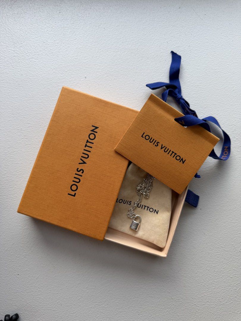 Louis Vuitton Silver Lockit Pendant (Category: Necklaces) located in Quezon City. Submitted by bubbles613 (Listing ID 1433976932, Image 1). Description: Sterling silver With original box and pouch 100% authentic From LV Greenbelt.