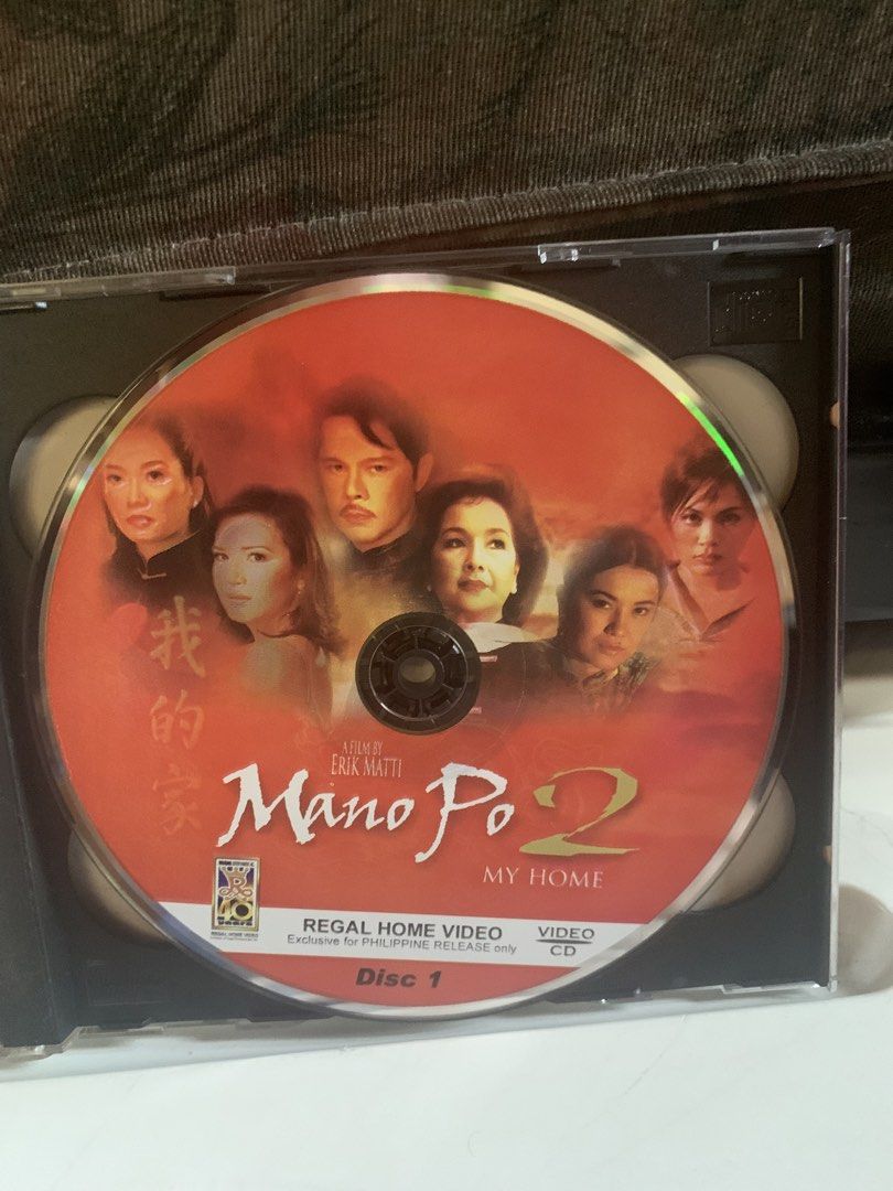 Mano Po 2: My Home Video CD (Category: CDs & DVDs) located in Valenzuela. Submitted by moonlightperks (Listing ID 1434057631, Image 3). Description: - "Mano Po 2: My Home" on Regal Home Video CD - Includes Disc 1 and Disc 2 - Directed by Erik Matti - Starring: Susan Roces, Christopher De Leon, Lorna Tolentino, and more - Official entry to the 2003 Metro Manila Film Festival.