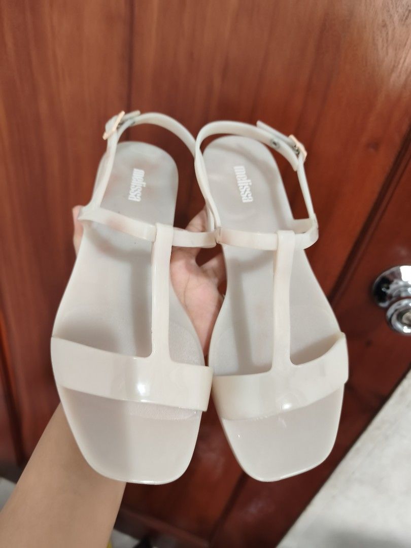 Melissa Sandals (Category: Flats & Sandals) located in Batac City. Submitted by cletzdeclutter (Listing ID 1434080403, Image 1). Description: - Melissa sandals - Size: 37 EUR / 3.5 BRA / 6 USA - Still with scent - Issue: color transfer due to storage (can be seen on last two photos) Refer to photos for the item's condition Please manage expectations when buying preloved items. Bawal sa maseselan/ maarte Colors may vary due to lighting Buy at your