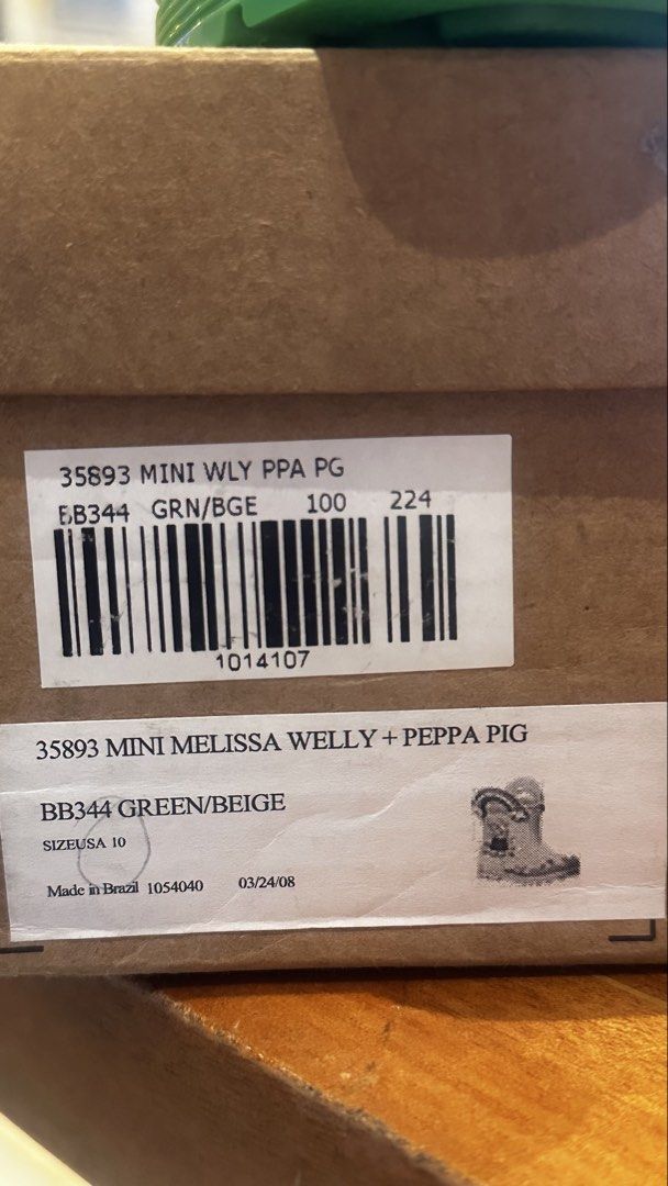 Mini Melissa Welly + Peppa Pig Boots (Category: Babies & Kids Fashion) located in Manila. Submitted by pinklilo (Listing ID 1434171709, Image 2). Description: - Mini Melissa Welly boots - Features Peppa Pig design - Size 10 - Made in Brazil - Color: Green and beige - Waterproof and stylish - Perfect for Peppa Pig fans.