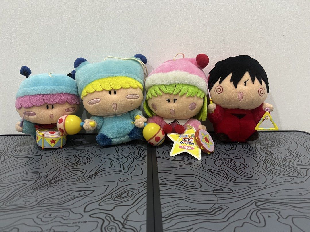 Mirumo Mirmo De Pon Instrument Plush Set (Category: Plushies & Soft Toys) located in Binan City. Submitted by tring_ (Listing ID 1434007834, Image 1). Description: Mirumo Mirmo De Pon Instrument Plush Set Mirumo De Pon Length: 17cm Width: 11.5cm (head), 7.5cm (body) Details: No paper tag Cloth tag minimally faded Specks of dust on head, hands, and maracas Left maracas removed from thread Murumo De Pon Length: 14cm Width: 10.5cm (head), 5.5cm (bod