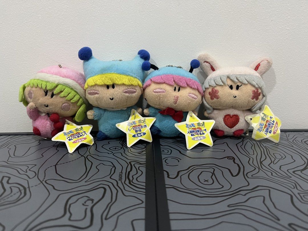 Mirumo Mirmo De Pon Mascot Plush Keychain Set (Category: Plushies & Soft Toys) located in Binan City. Submitted by tring_ (Listing ID 1433998233, Image 1). Description: Mirumo De Pon Mascot Plush Keychain Set Mirumo De Pon Mascot Plush Keychain Length: 10cm Width: 6.5cm (head), 4cm (body) Details: Light dust specks on head, face, and body Crumpled paper tag Clear cloth tag Old ball chain Murumo De Pon Mascot Plush Keychain Length: 8.5cm Width: 6c