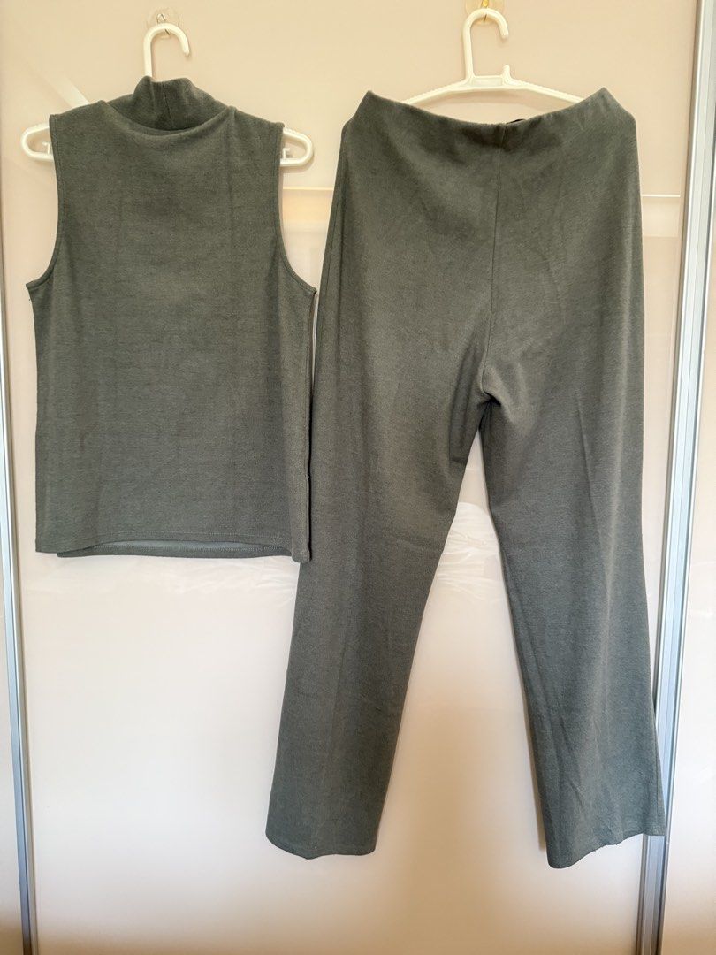 Sleeveless Top and Pants Set - Mango Brand (Category: Sets or Coordinates) located in Quezon City. Submitted by magnolianovie (Listing ID 1434030080, Image 2). Description: Set includes a sleeveless top and pants from MNG. The top has a turtleneck design. The pants have a straight leg cut. The set is made of a soft, likely knit fabric. The top is size M, and the pants are size L. The set is a solid gray color..