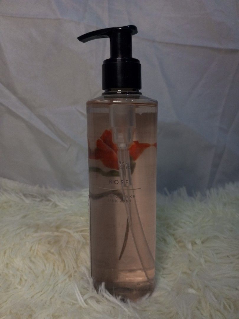 M&S Rose Hand Wash 250ml (Category: Bath) located in Quezon City. Submitted by czyrainkaye (Listing ID 1434140312, Image 1). Description: - M&S Rose Hand Wash - 250ml bottle with pump dispenser - Infused with a delightful rose fragrance - Clear liquid with a charming rose design - Product information available on the back - Specifically formulated as a hand wash.