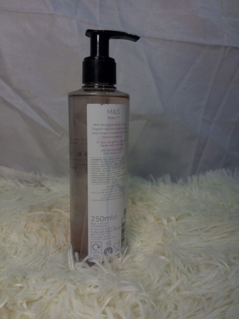 M&S Rose Hand Wash 250ml (Category: Bath) located in Quezon City. Submitted by czyrainkaye (Listing ID 1434140312, Image 2). Description: - M&S Rose Hand Wash - 250ml bottle with pump dispenser - Infused with a delightful rose fragrance - Clear liquid with a charming rose design - Product information available on the back - Specifically formulated as a hand wash.