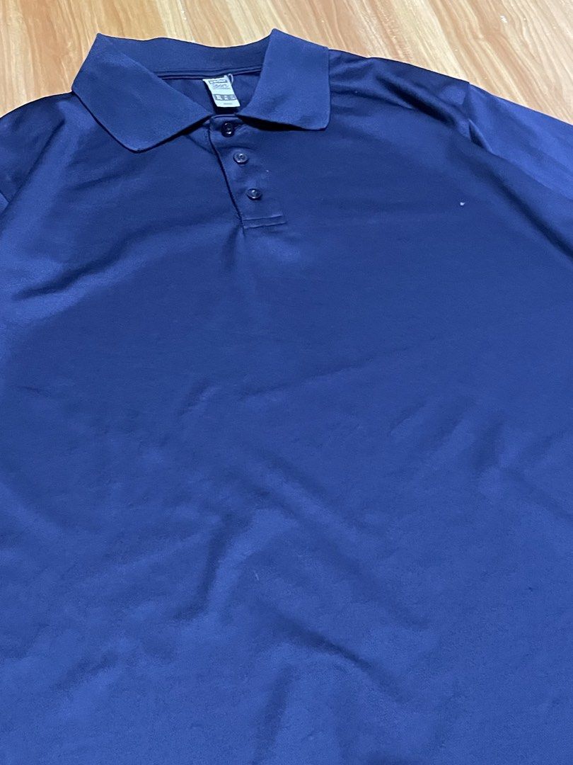 Navy Blue Short Sleeved Polo Shirt (Category: Tshirts & Polo Shirts ) located in Cavite. Submitted by verubelovedstuff (Listing ID 1434093966, Image 3). Description: Navy Blue Polo Shirt 👕🔵 Men • Size: XL 📏 • Color: Navy Blue 🔵 • Length (L): 29 in • Width (W): 22 in • Condition: Excellent (10/10) ✨ — no stains, no holes, no fading, clean and well-maintained fabric Price: ₱100 💸 🤝 Negotiable – Reasonable Offers Welcome Simple and clean navy 
