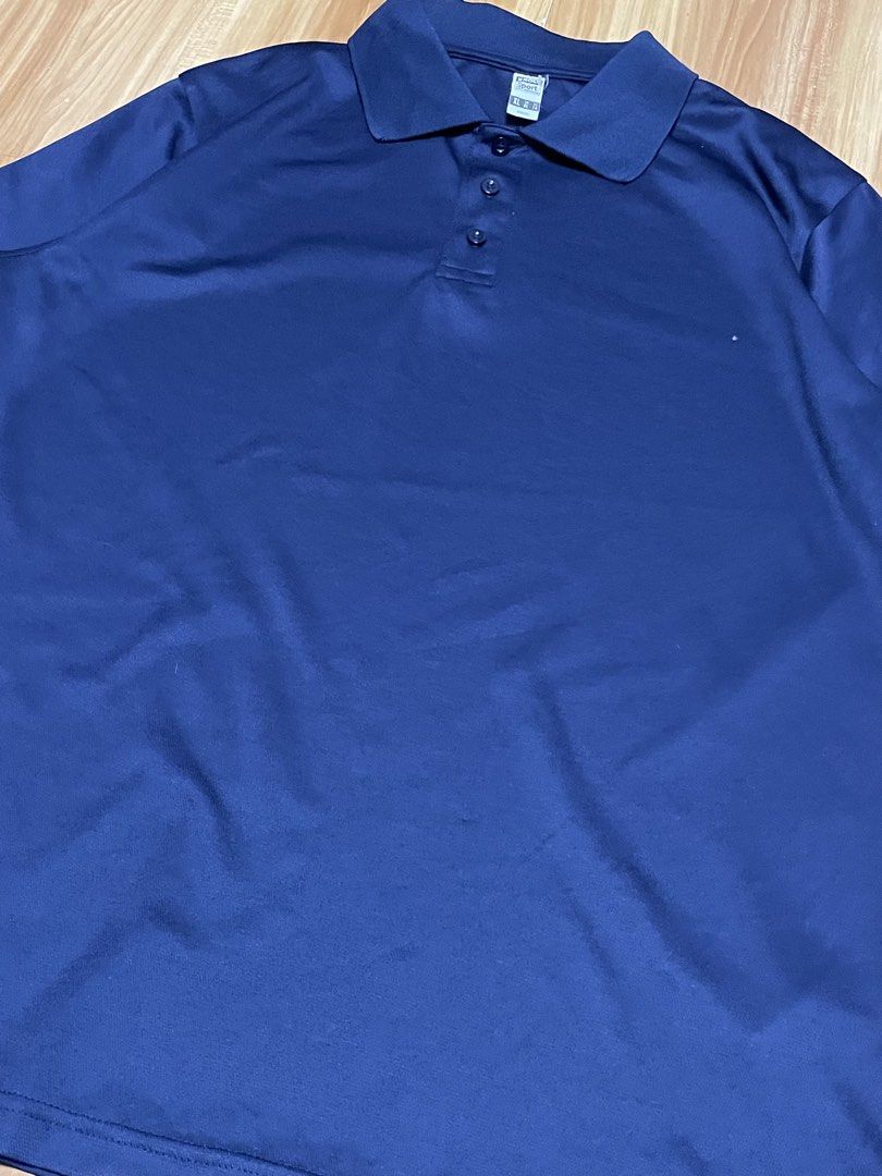 Navy Blue Short Sleeved Polo Shirt (Category: Tshirts & Polo Shirts ) located in Cavite. Submitted by verubelovedstuff (Listing ID 1434093966, Image 2). Description: Navy Blue Polo Shirt 👕🔵 Men • Size: XL 📏 • Color: Navy Blue 🔵 • Length (L): 29 in • Width (W): 22 in • Condition: Excellent (10/10) ✨ — no stains, no holes, no fading, clean and well-maintained fabric Price: ₱100 💸 🤝 Negotiable – Reasonable Offers Welcome Simple and clean navy 