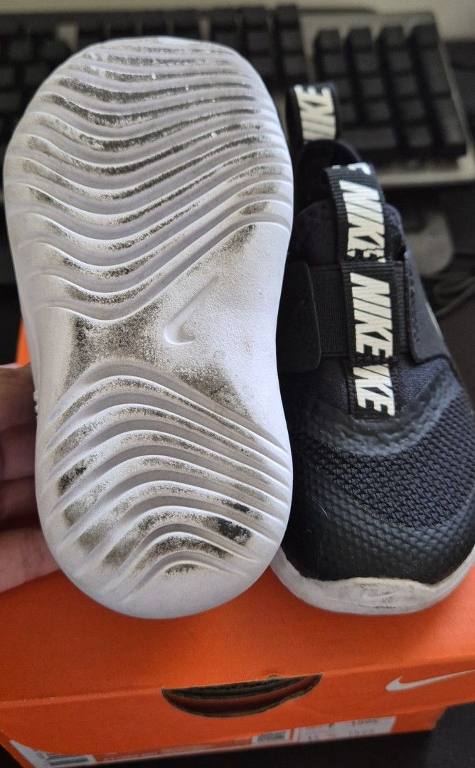 Nike Flex Runner Baby Shoes Black (Category: Babies & Kids Fashion) located in Pasig City. Submitted by mamaconcep (Listing ID 1434086907, Image 2). Description: - Nike Flex Runner baby shoes - Color: Black - Size: 6C - Design: Slip-on - Upper: Mesh - Soles: White - Features Nike logo - Condition: Soles show wear.