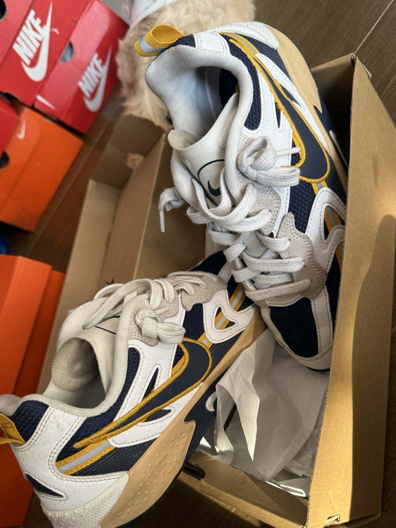 Nike JAM Sneakers (Category: Sneakers) located in Manila. Submitted by aeronvsbbf (Listing ID 1434006859, Image 2). Description: - Stylish Nike sneakers - Unique design with white, navy blue, and yellow accents - Light brown soles - Comes with original box (hindi ko lang na-pic, pero will provide it to u) -Size W-8 M-6.5 - Never been worn, never been used ever - Original 💯.