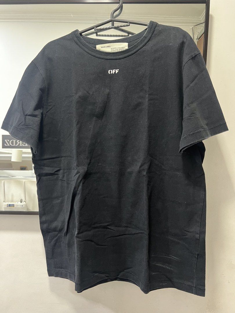 Off-White Black T-Shirt (Category: Tshirts & Polo Shirts ) located in Meycauayan. Submitted by 3fold (Listing ID 1434020818, Image 1). Description: - Off-White black t-shirt - "OFF" print on the front - Graphic print on the back with yellow accents - Crew neck and short sleeves - From the Spring/Summer 2018 collection - Made in Portugal - 27x23 dimes.