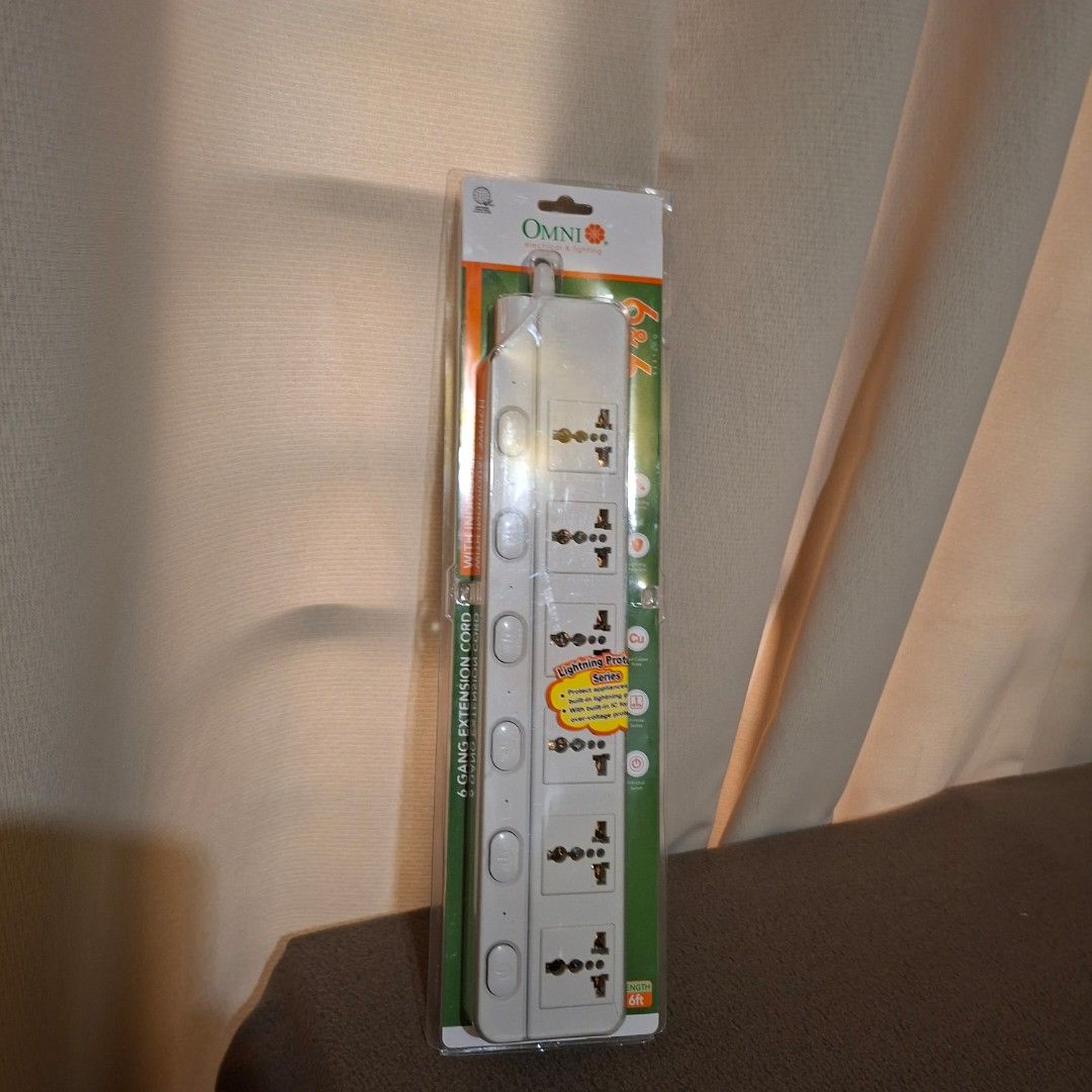 Omni 6 Gang Extension Cord (Category: Electrical, Adaptors & Sockets) located in Pasig City. Submitted by fast-ship (Listing ID 1434120652, Image 3). Description: - Omni 6-gang extension cord - Multiple universal outlets - Individual switches for each outlet - White color - Brand new, in original packaging.