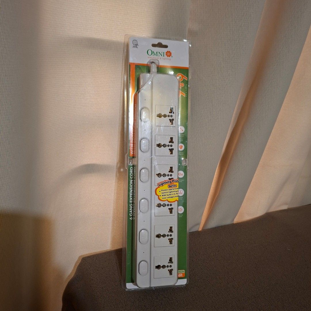 Omni 6 Gang Extension Cord (Category: Electrical, Adaptors & Sockets) located in Pasig City. Submitted by fast-ship (Listing ID 1434120652, Image 2). Description: - Omni 6-gang extension cord - Multiple universal outlets - Individual switches for each outlet - White color - Brand new, in original packaging.