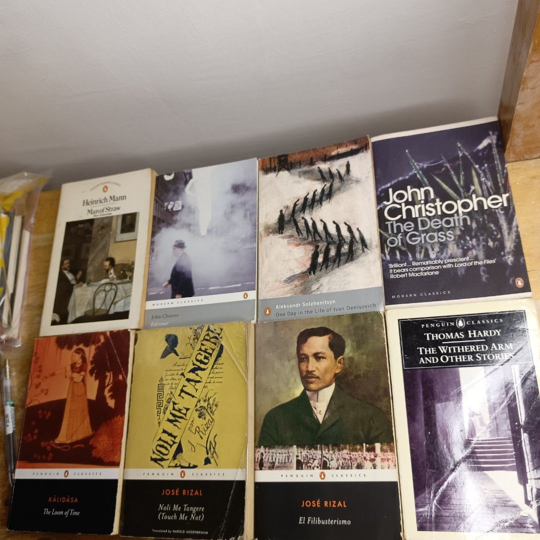 Penguin Classics Books Collection (Category: Storybooks) located in Manila. Submitted by shelfenjoyment (Listing ID 1434125441, Image 1). Description: 249-449 pesos. sold: * noli * el fili * kalidasa Collection of Penguin Classics books, including titles like "Noli Me Tangere", "El Filibusterismo", "The Death of Grass", and "The Withered Arm and Other Stories". Perfect for readers interested in classic literature..