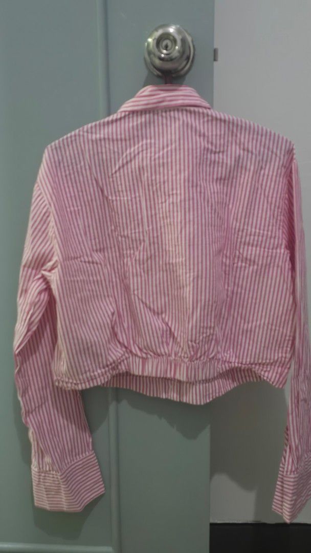 Pink Striped Long Sleeve Shirt (Category: Longsleeves) located in Quezon City. Submitted by k8_wallace (Listing ID 1434126428, Image 2). Description: - Pink and white striped long sleeve shirt - Collared neckline - Button-down closure - crop top - Long sleeves with buttoned cuffs - Lightweight fabric - Suitable for warmer weather - worn twice lang.