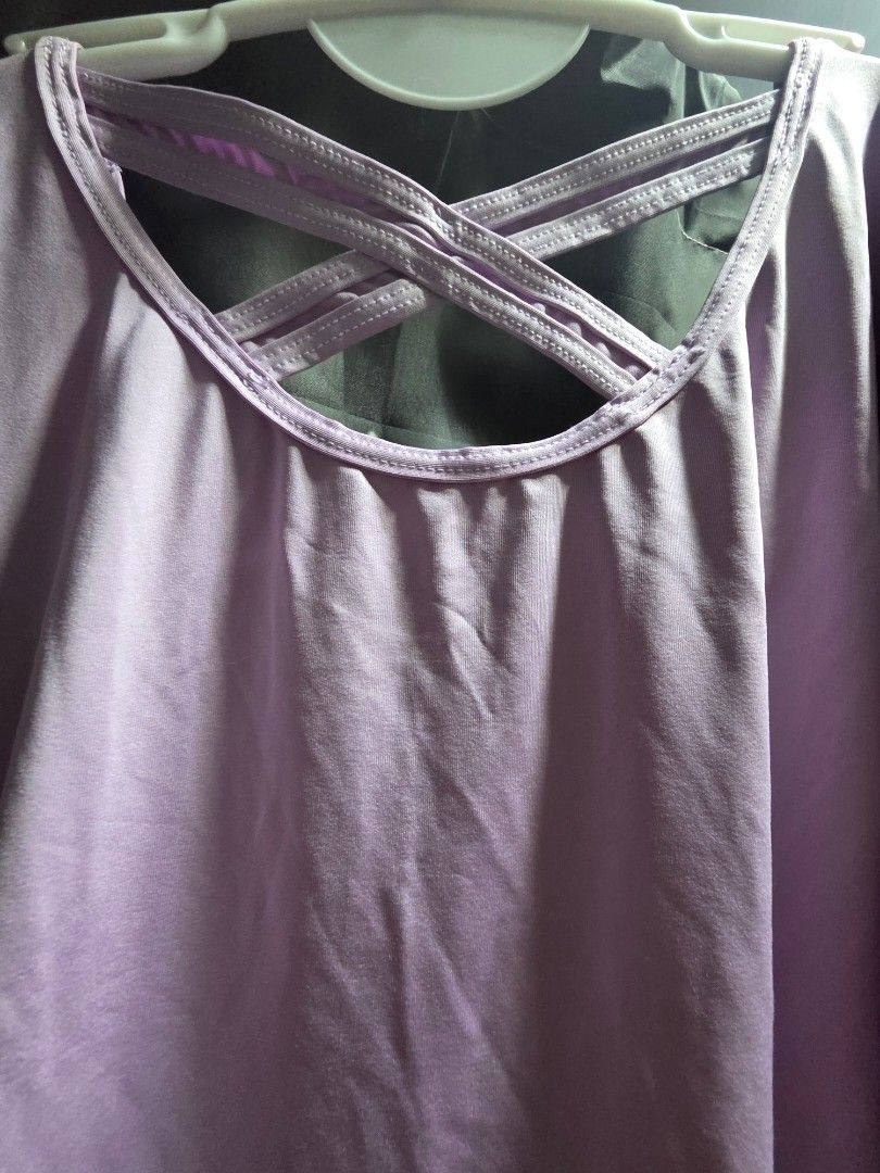 PLUS SIZE Purple Crossover Back Dri-Fit Top (Category: Activewear) located in Manila. Submitted by plussizedpixie (Listing ID 1434109629, Image 2). Description: - Purple top with a unique crossover back design. - Features a classic round neckline. - Designed with comfortable short sleeves. - Made from lightweight fabric, ideal for workouts. - Solid color for easy pairing with different bottoms. - My weight is 89 kilos. My waste is 36 inches..