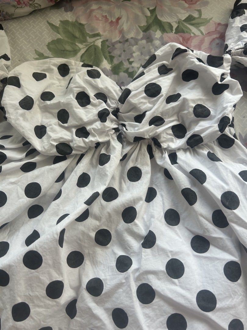Polka Dot Babydoll Top (Category: Blouses) located in Manila. Submitted by cheatea (Listing ID 1434040073, Image 2). Description: - Off-shoulder design - Black polka dot print - Sweetheart neckline - Ruffled sleeves - Gathered bust detail - Lightweight fabric - Feminine and playful style - Ideal for warm weather.