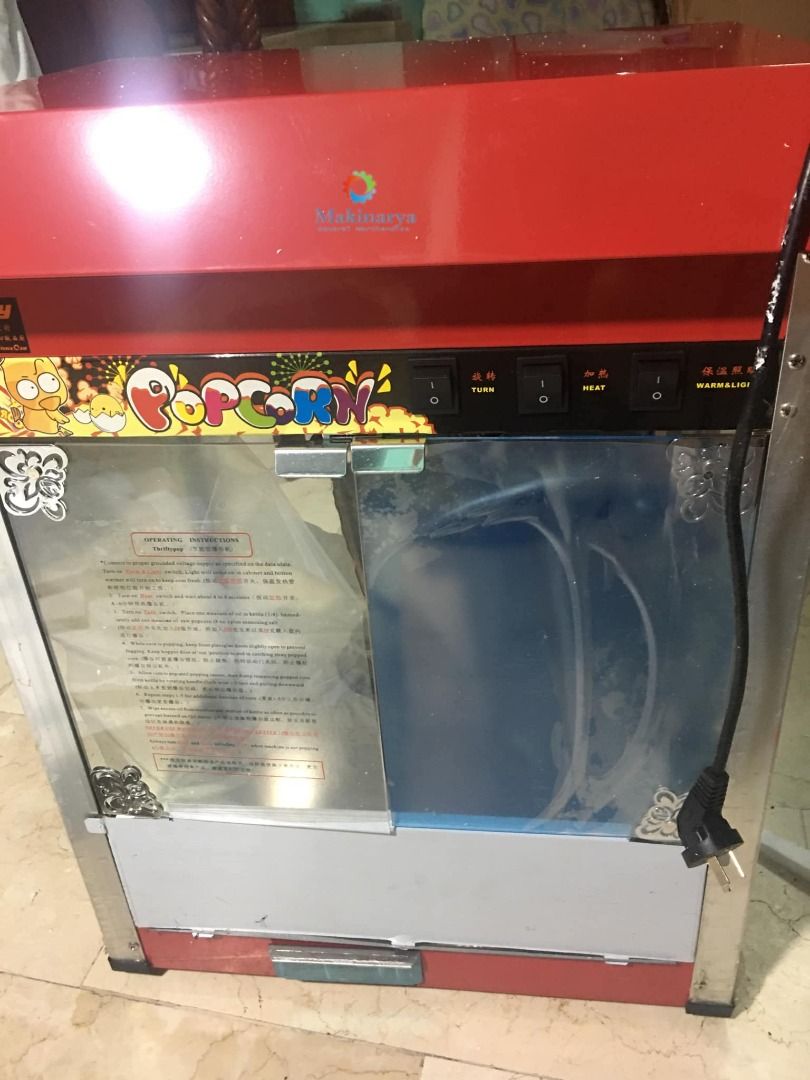 Popcorn Machine Heavy duty (Category: Other Kitchen Appliances) located in Manila. Submitted by makinaryageneral.merchandise (Listing ID 1079472171, Image 2). Description: Specifications: 1. large capacity 2. smart control 3. easy to operate 4. easy to clean. 5.non-stick coating 6.Bowl Capacity 6ounce COLOR: PINK / RED Power: 1.3kW Volts: 220V 50HzBowl Capacity: 6 ounce Dimension: 50*23*56cm Net Weight: 21kg .