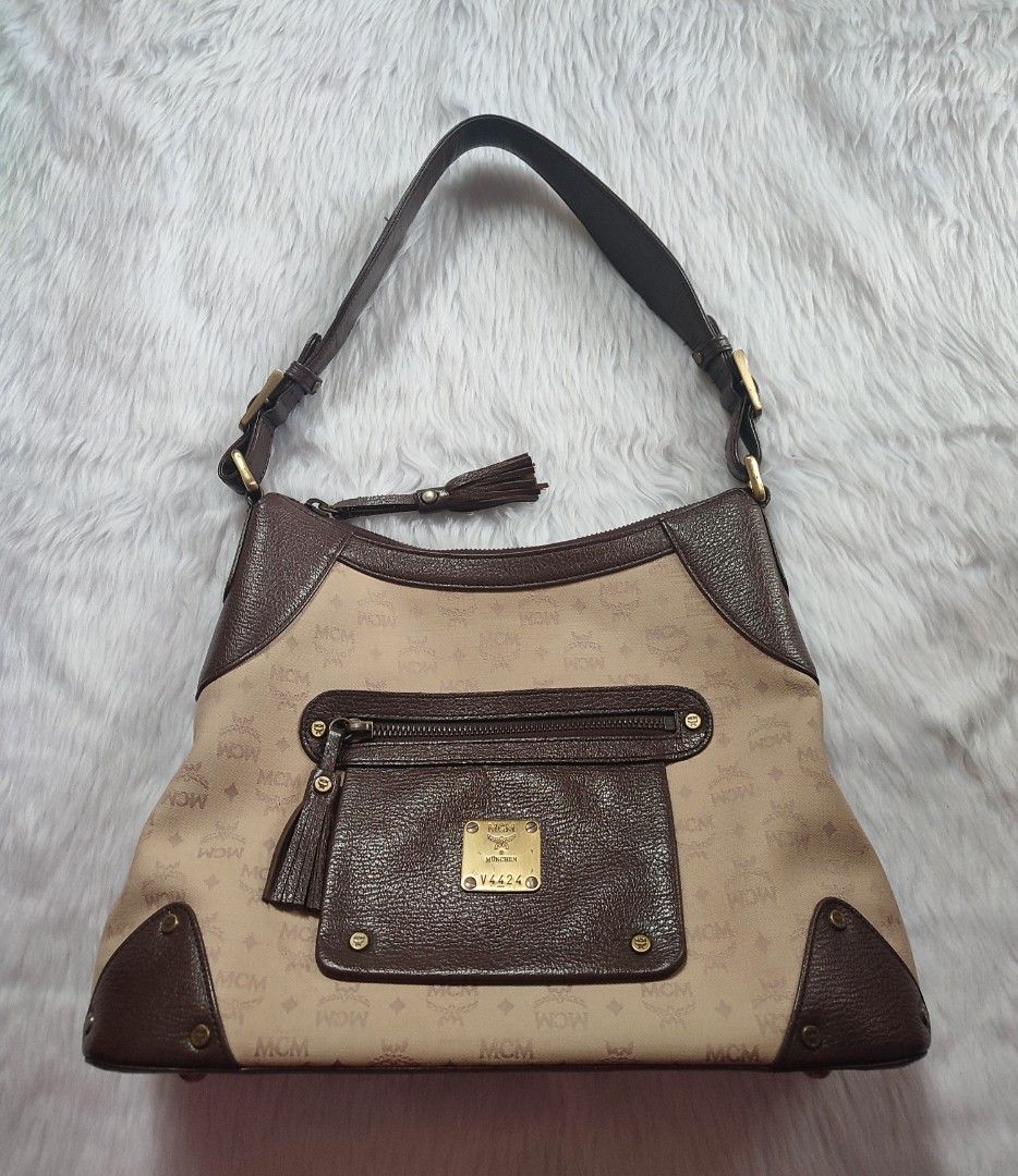 Preloved Authentic MCM Shoulder Bag (Category: Luxury Bags & Wallets) located in Bulacan. Submitted by mandjays (Listing ID 1434135247, Image 1). Description: Good condition. No flaws, signs of usage only. Rfs. Need funds Negotiable!.