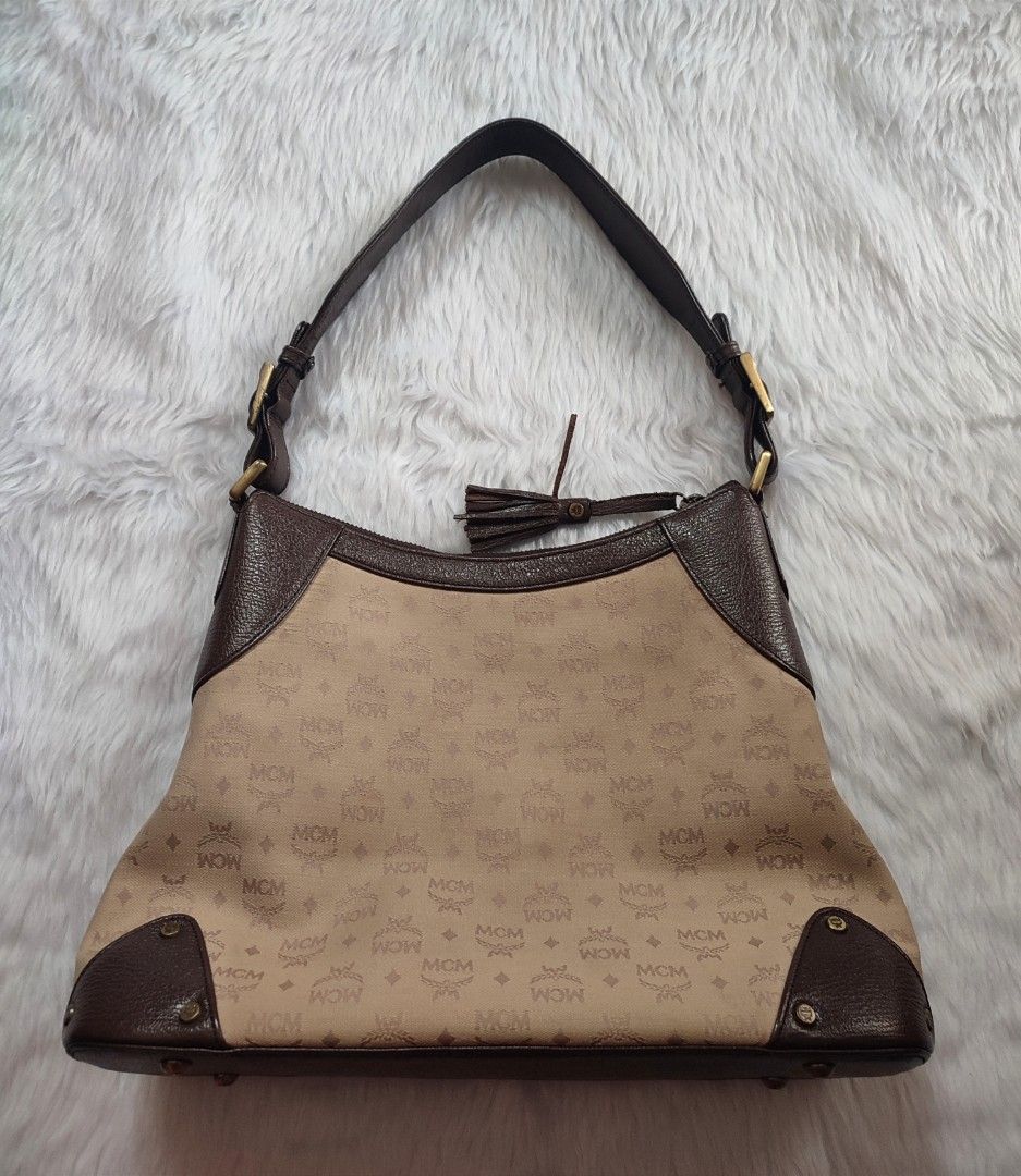 Preloved Authentic MCM Shoulder Bag (Category: Luxury Bags & Wallets) located in Bulacan. Submitted by mandjays (Listing ID 1434135247, Image 2). Description: Good condition. No flaws, signs of usage only. Rfs. Need funds Negotiable!.