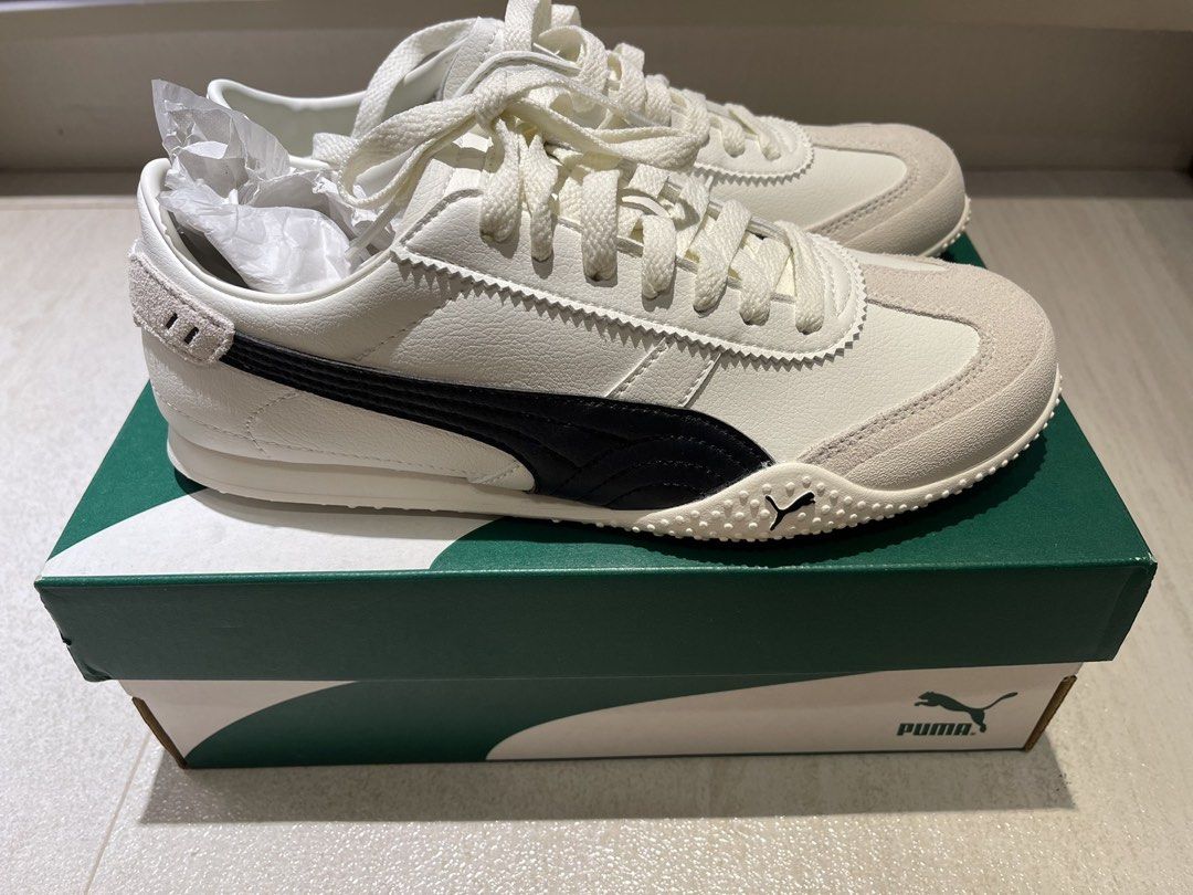 Puma Bella UT LEA Warm White Sneakers (Category: Sneakers) located in Makati City. Submitted by anne2124 (Listing ID 1434101219, Image 1). Description: - Puma Bella UT LEA sneakers - Color: Warm white and black - Size: US Women's 8.5, UK 6, EUR 39 - Condition: New with original box - Sole: White with dotted pattern - Features: Suede toe cap, black Puma stripe Bnew never worn. Impulse buy. Bought in Puma at Parqal.