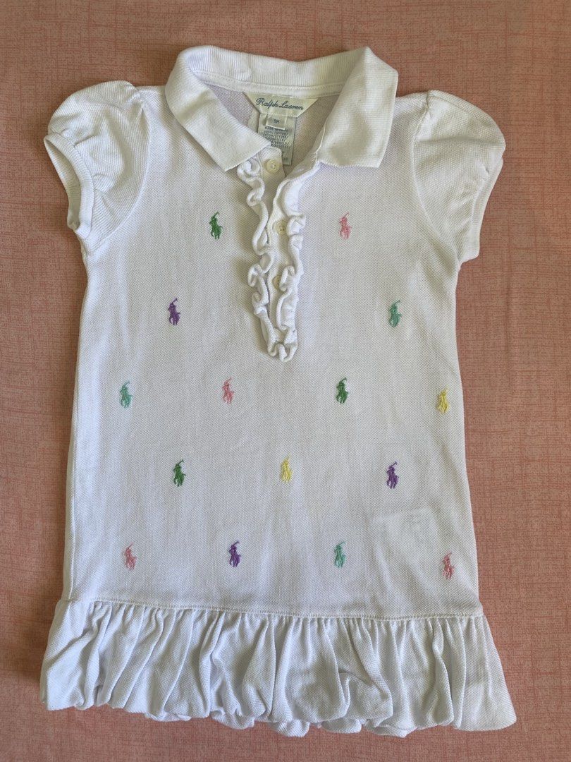 RL White Multipony Dress (Category: Babies & Kids Fashion) located in Palo. Submitted by armc07 (Listing ID 1433997615, Image 1). Description: - Ralph Lauren multipony polo dress - Size: 9M - shipping thru flash express.
