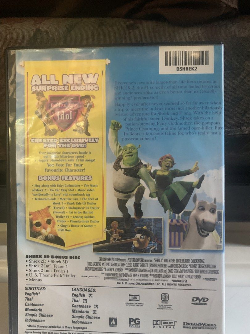 Shrek 2 DVD (Category: CDs & DVDs) located in Valenzuela. Submitted by moonlightperks (Listing ID 1434054480, Image 2). Description: Shrek 2 DVD. Includes two discs. Features bonus content such as a 3D bonus disc, trailers, and more. Subtitles available in English, Thai, Mandarin, and other languages. Includes a "Far Far Away Idol" bonus feature..