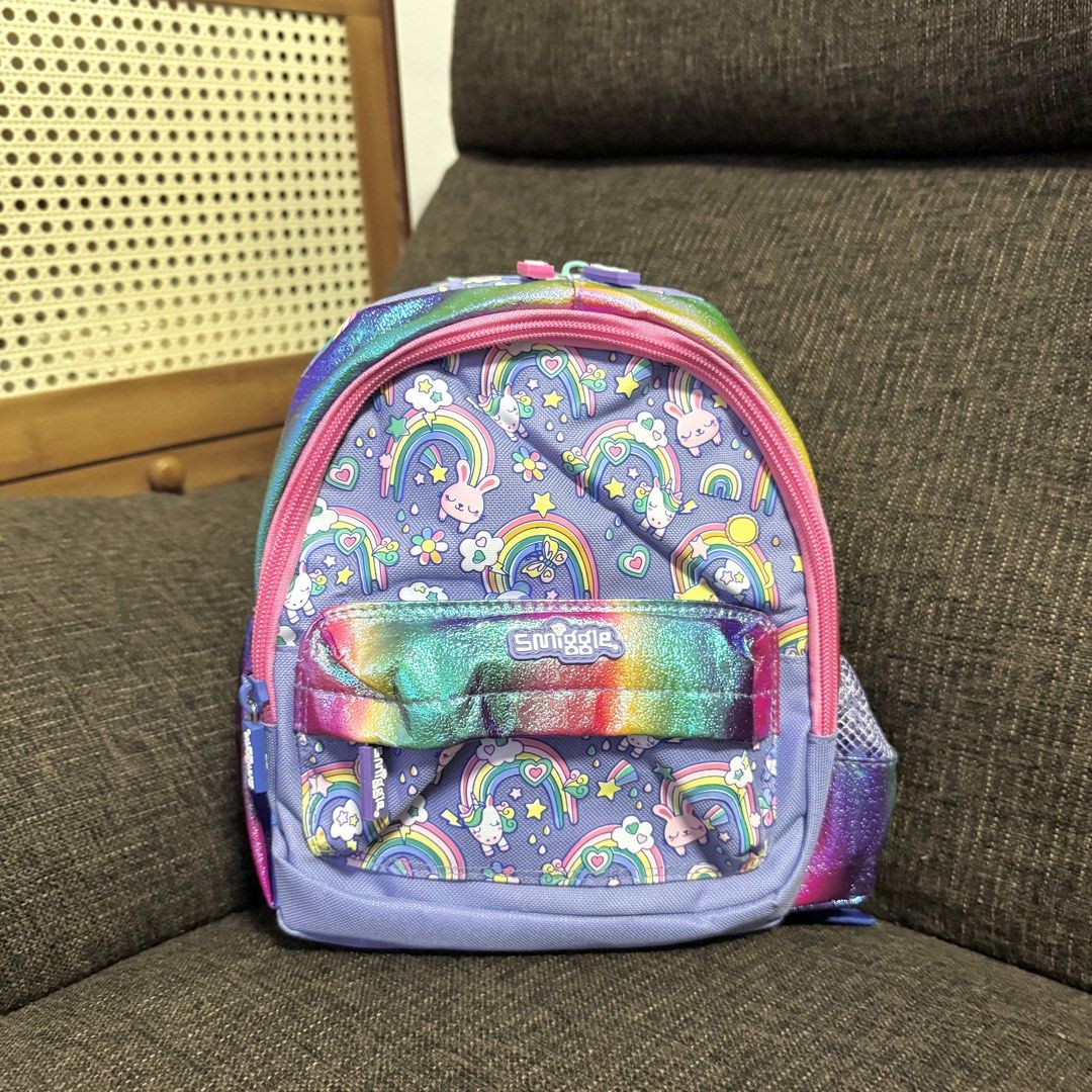 Smiggle Teeny Tiny Backpack (Category: Diaper Bags & Wetbags) located in Bulacan. Submitted by mykakarizza (Listing ID 1434061132, Image 1). Description: Madami pa designs available ✨✨ ₱750 only Teeny Tiny Backpack 📏 26 × 10 × 21 cm 🛍️ With S'mggl* Plastic Bag 💸 ₱900 only! 📸 Actual pics! 🙋🏻‍♀️ ─── ✦ ─── ✦ ─── ✦ ─── ✦ ─── 🛍️ LOOKING FOR MORE RESELLERS 🛍️ ✨ Buy 3 pcs of ANY items — FREE SHIPPING NA!🚚 ✨ Buy 10 items → FREE SF + ₱50 OFF EACH