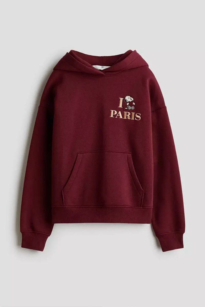 Snoopy I Love Paris Hoodie (Category: Longsleeves) located in Manila. Submitted by 18.06_ds (Listing ID 1434090967, Image 1). Description: - Maroon hoodie - Features "I Paris" phrase with Snoopy graphic - Kangaroo pocket - Hooded - Soft material - Ribbed cuffs on sleeves - Casual and comfortable design.