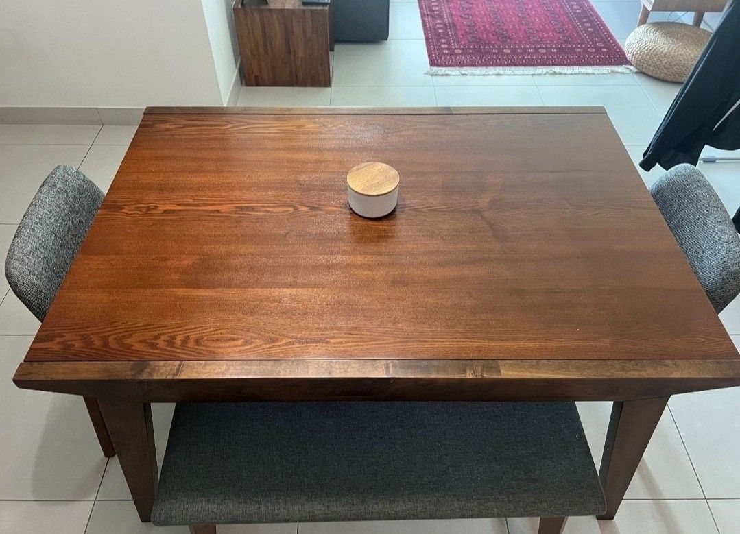 Solid Wooden Dining Table - Extendable (Category: Tables & Sets) located in Singapore. Submitted by etlas (Listing ID 1434077938, Image 1). Description: Beautiful Solid Wood Table, 1m wide, 1.4m long. 2.4m when extended. Extension mechanism carved within the table without metal parts. This makes it more durable and easy to operate. Perfect for family meals and entertaining.