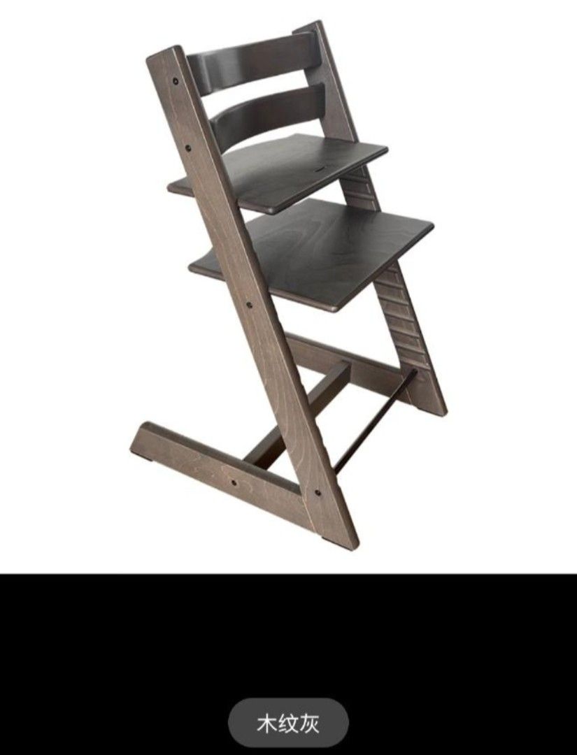 Stokke Tripp Trapp High Chair - Wood Grain Grey (Category: Baby High Chairs) located in Singapore. Submitted by naturalcbn (Listing ID 1434002233, Image 1). Description: Stylish and ergonomic Stokke Tripp Trapp high chair. Features a wood grain grey finish. Designed to bring your baby to the table, promoting interaction and bonding. Adjustable seat and footrest for optimal comfort and support. Excellent condition, ready for use..