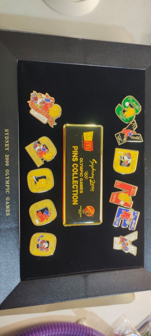 Sydney 2000 Olympic Games Pins Collection (Category: Vintage Collectibles) located in Pulilan. Submitted by cbssurplus (Listing ID 1434135003, Image 1). Description: - Complete set of Sydney 2000 Olympic Games pins. - Includes pins spelling "SYDNEY". - Features Olympic-themed design pins. - Comes with a commemorative plaque. - Original box, stand, and instructions included. WE SHIP NATIONWIDE VIA J&T.