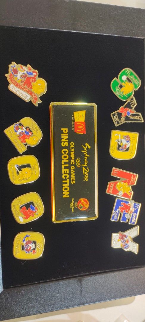 Sydney 2000 Olympic Games Pins Collection (Category: Vintage Collectibles) located in Pulilan. Submitted by cbssurplus (Listing ID 1434135003, Image 2). Description: - Complete set of Sydney 2000 Olympic Games pins. - Includes pins spelling "SYDNEY". - Features Olympic-themed design pins. - Comes with a commemorative plaque. - Original box, stand, and instructions included. WE SHIP NATIONWIDE VIA J&T.