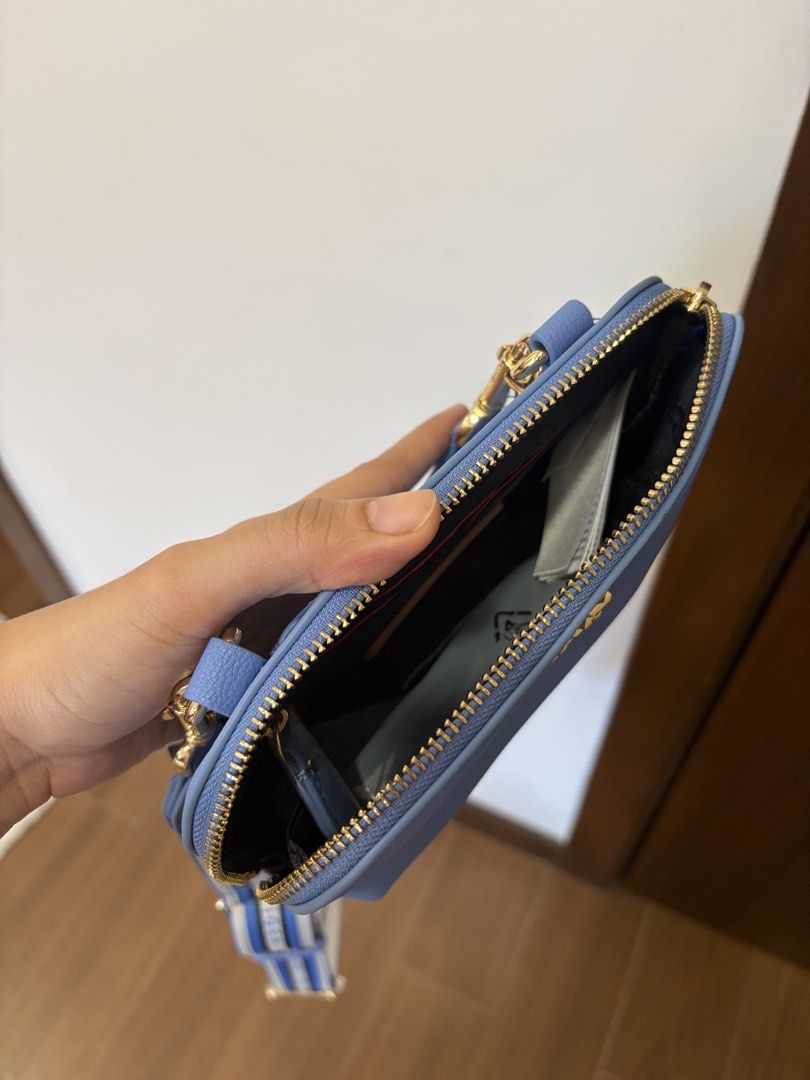 Tommy Hilfiger Crossbody Bag (Category: Cross-body Bags) located in Davao. Submitted by _casells (Listing ID 1433996696, Image 3). Description: **Tommy Hilfiger Blue Crossbody Bag (Brand New w/ Tags)** 💙 Authentic Tommy Hilfiger mini crossbody / camera bag 💙 Brand new with tag (never used) 💙 Color: Light blue 💙 Gold-tone hardware with TH logo 💙 Adjustable logotape strap (can be worn crossbody or shoulder) 💙 Zip closure, compact but fits ess
