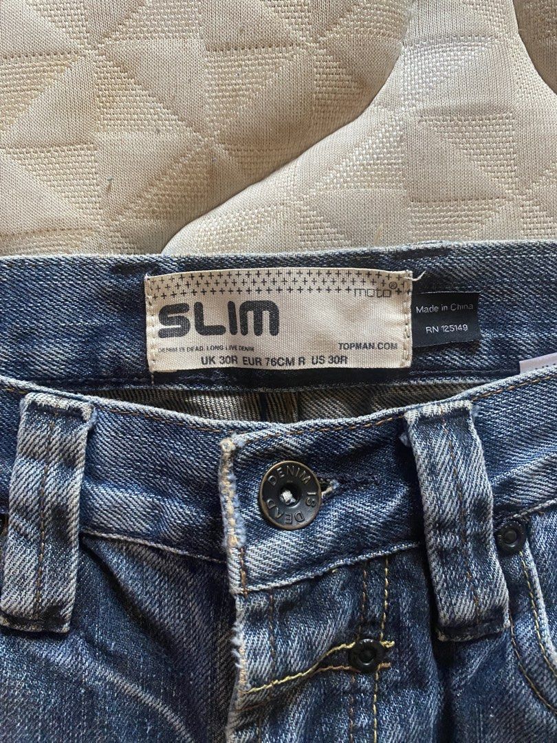 Topman Slim Fit Jeans (Category: Jeans) located in Mandaluyong City. Submitted by mandaboy10 (Listing ID 1433996108, Image 3). Description: - Topman slim fit jeans - Light blue wash - Distressed details with ripped accents - Classic five-pocket design - Straight leg - Button closure - Size 30inches waist can fit up to 5’8 guy.