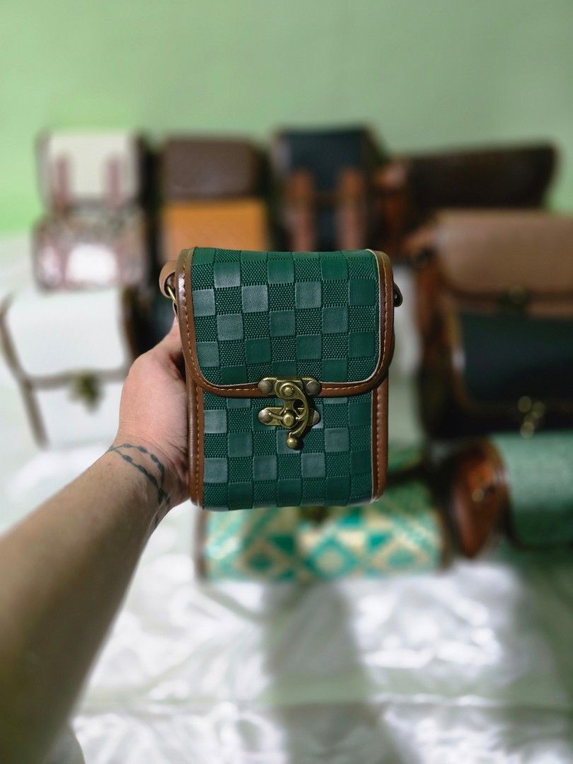 Vegan Leather Box Bag with Woven Design (Category: Cross-body Bags) located in Rodriguez. Submitted by mnl_premium_essentials (Listing ID 1434158611, Image 2). Description: Stylish box bag featuring a woven design. It has a secure clasp closure and a brown trim. Available in blue denim, green checkered, and white woven patterns. It is a great addition to your collection..