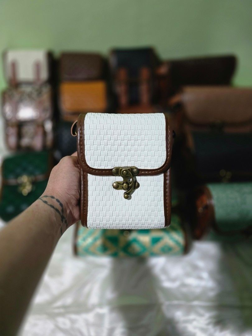 Vegan Leather Box Bag with Woven Design (Category: Cross-body Bags) located in Rodriguez. Submitted by mnl_premium_essentials (Listing ID 1434158611, Image 3). Description: Stylish box bag featuring a woven design. It has a secure clasp closure and a brown trim. Available in blue denim, green checkered, and white woven patterns. It is a great addition to your collection..