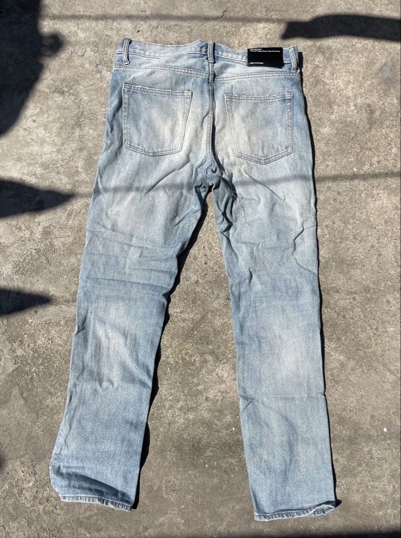 Vtg WTAPS Distressed Jeans (Category: Jeans) located in Caloocan City. Submitted by robincedri55369 (Listing ID 1434041558, Image 2). Description: Wtaps Distressed style Denim Jeans 33x41 size Medium on Tag Shipped Via Jnt or Lalamove - WTAPS jeans - Light blue wash - Size 34 - Button closure - Distressed detailing - Small red WTAPS tag - Leather WTAPS patch at back.